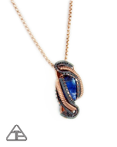 Tanzanite Raw Crystal Titanium and Rose Gold Wire Wrapped Pendant