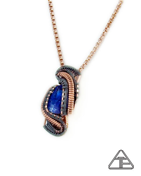 Tanzanite Raw Crystal Titanium and Rose Gold Wire Wrapped Pendant